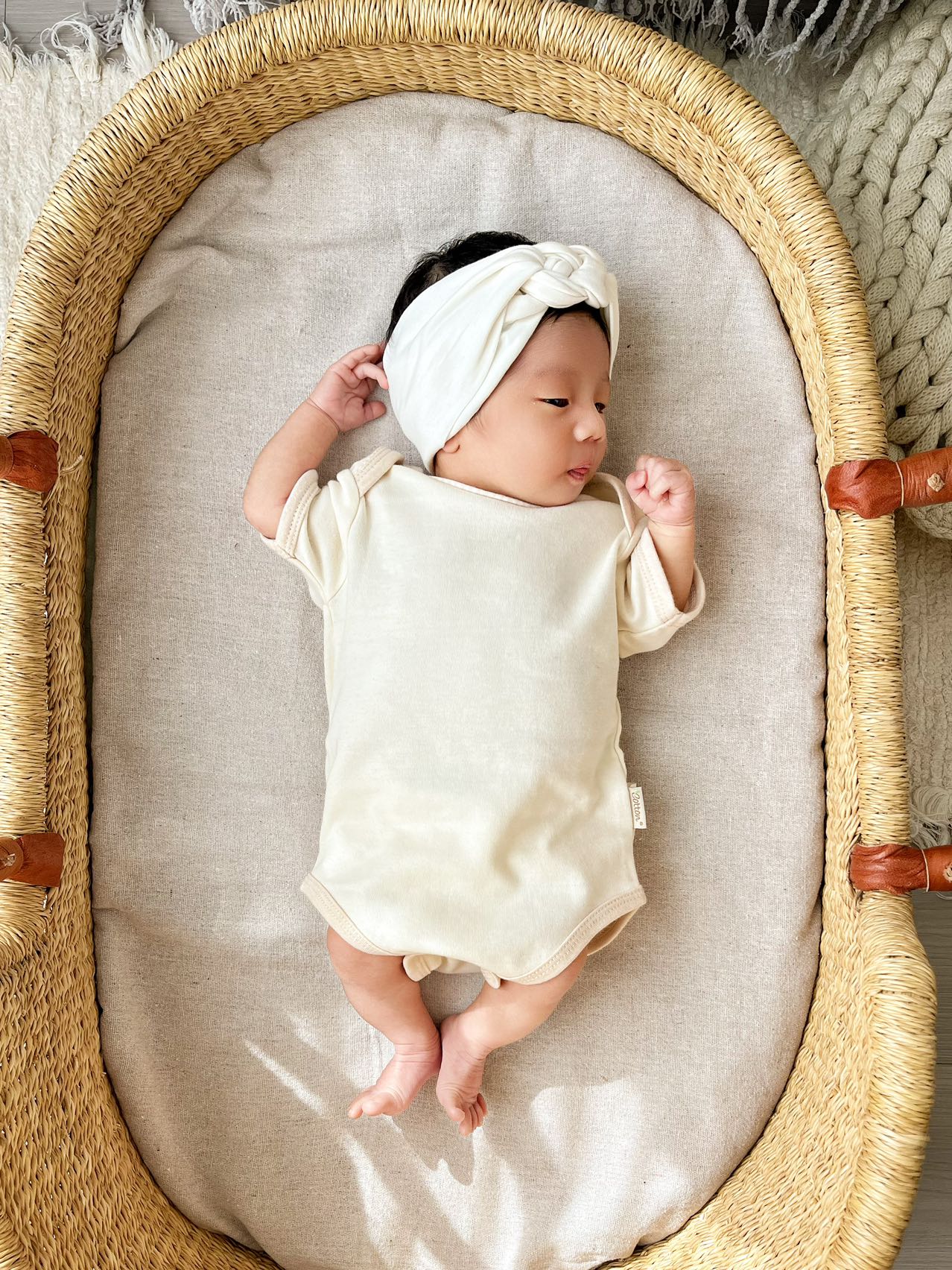Cute newborn baby in Eotton organic cotton gender neutral baby onesies - Softest and comfortable | Eotton Canada