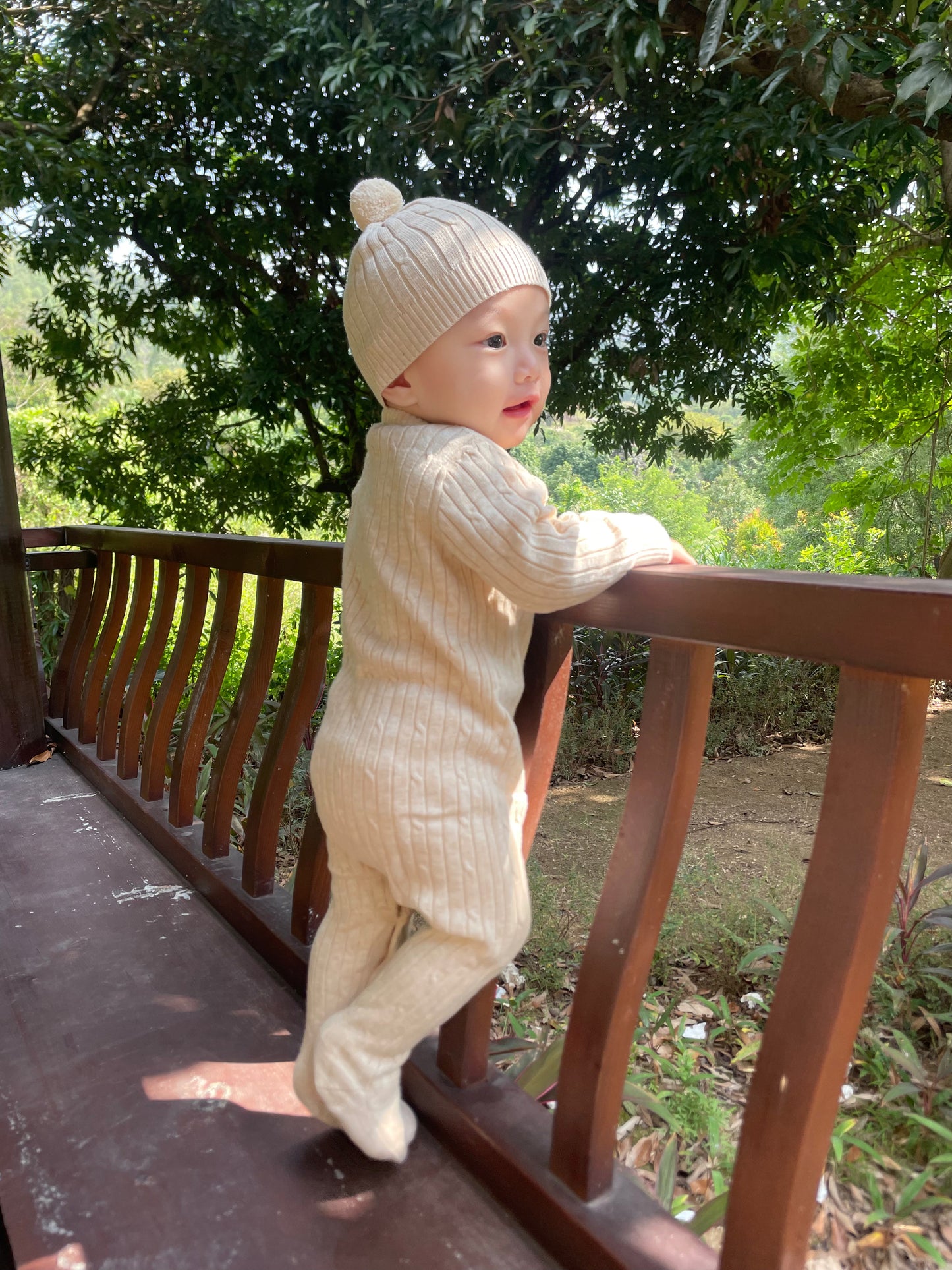 Organic cable knit footed romper and hat set