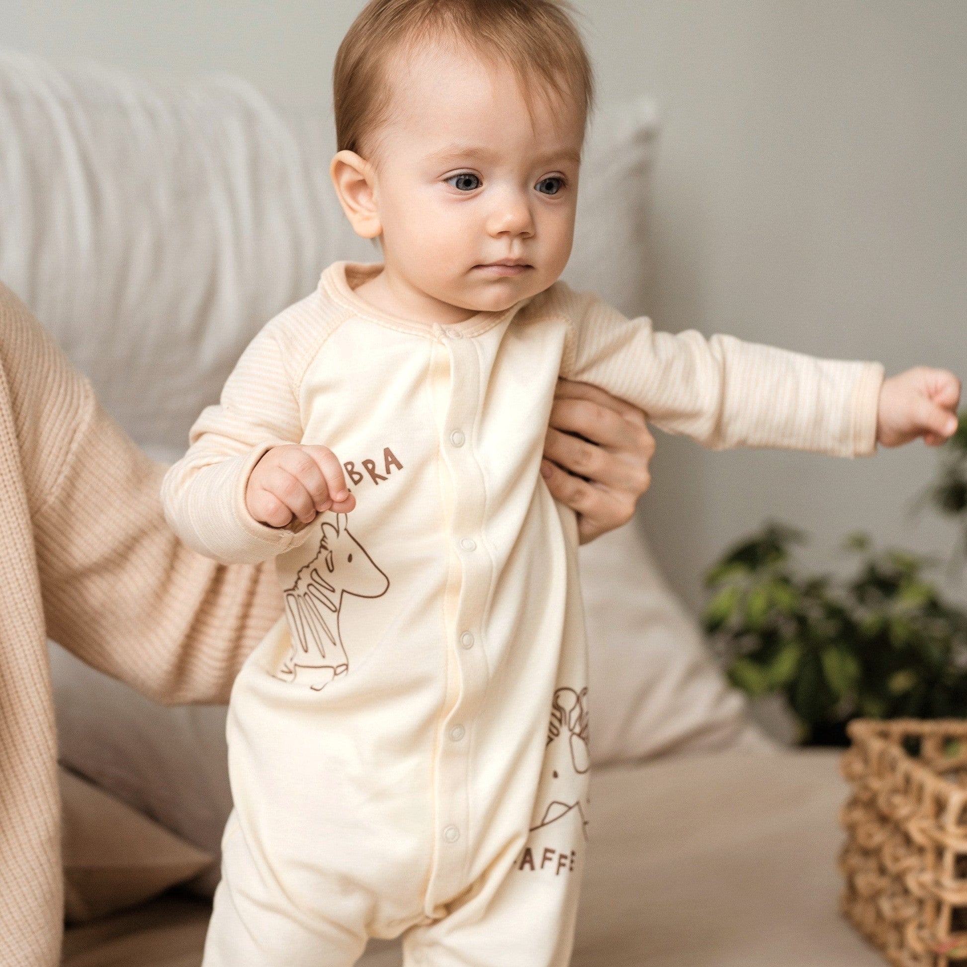 Gender Neutral Baby Clothes: Organic Footed Romper on 9 month old baby model