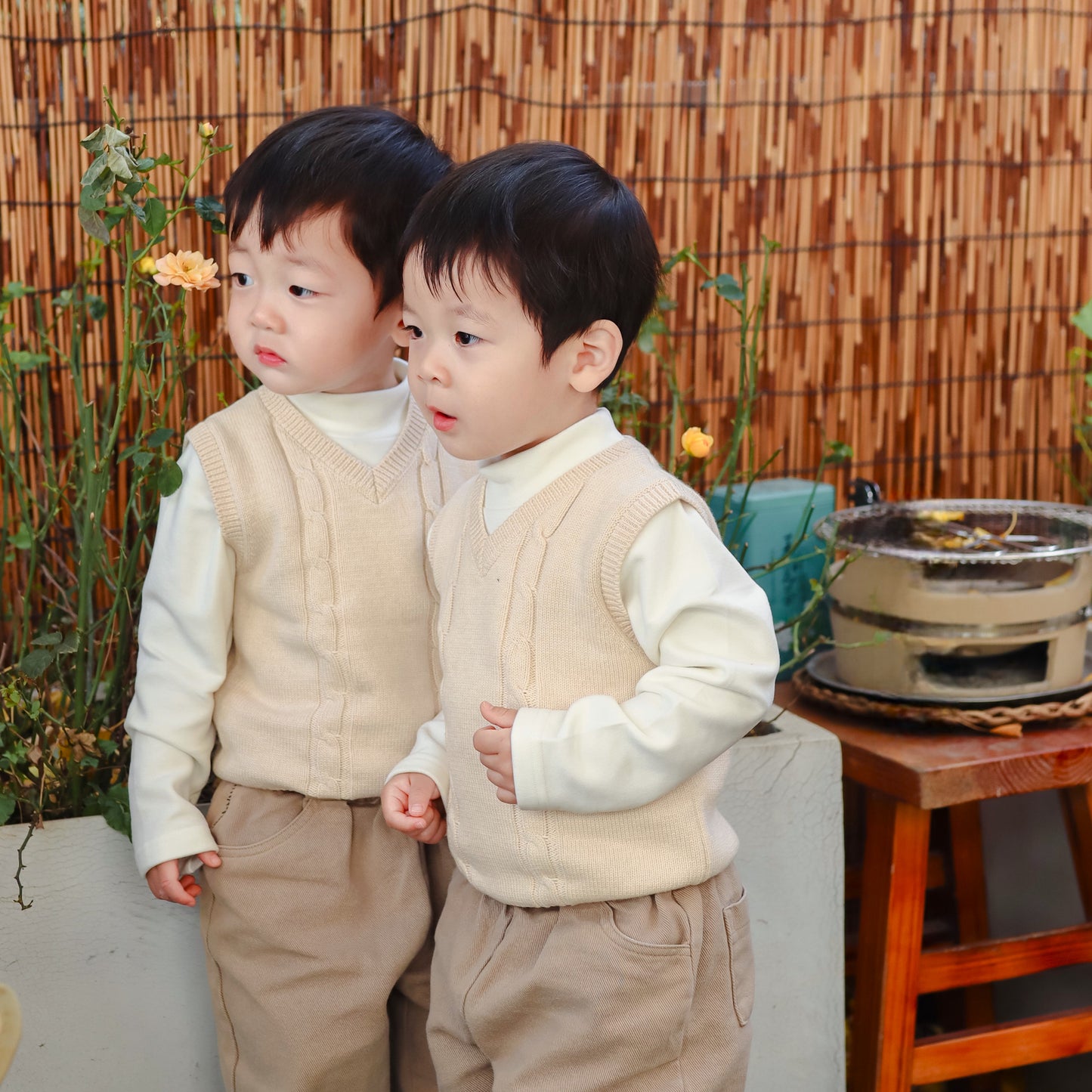 Lovely twins like Eotton's Toddler Knitted Vest: Organic V Neck Sweater Cable Knit | Eotton