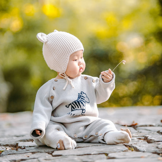 Chunky Cable Knit Sweater: Oversized Newborn Romper, Baby sitting on stone road in beautiful Autumn | Eotton Canada