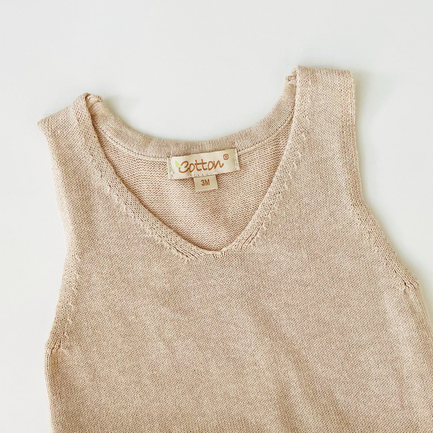 Organic Knitted Sweater: Baby Girl Cable Knit Ruffler Onesie detail fine knit | Eotton