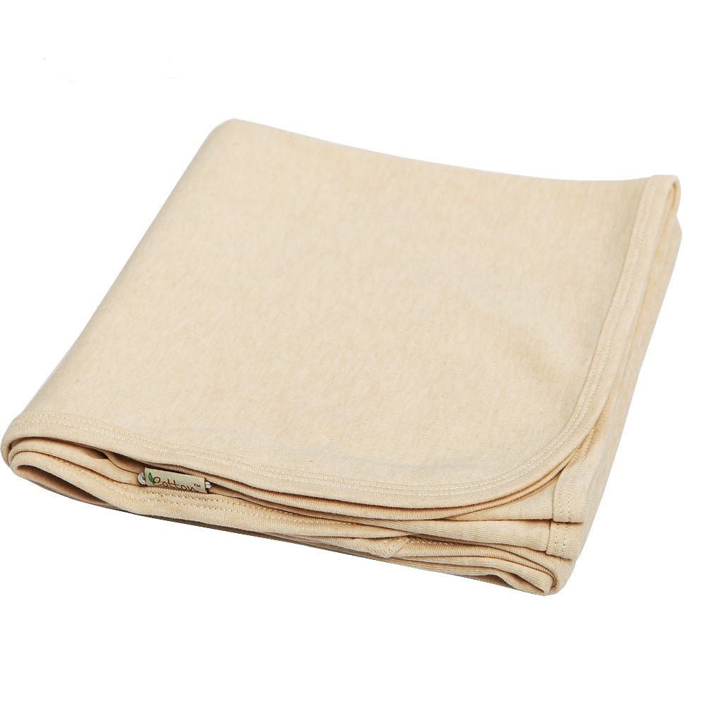 Lightweight single layer breathable cotton throw draped over an infant stroller seat for shade.