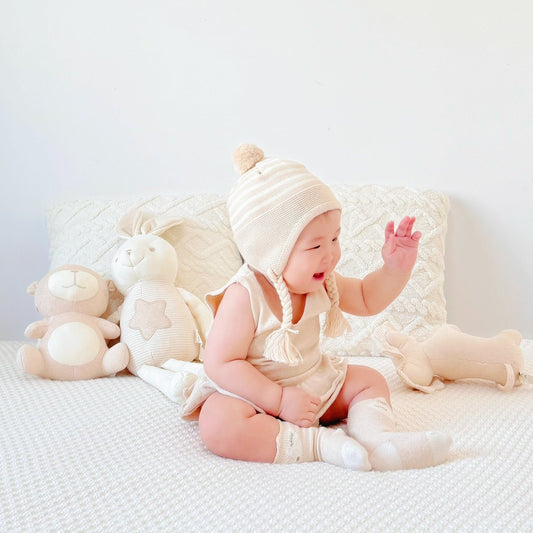 Organic baby sweaters & soft stuffed toys