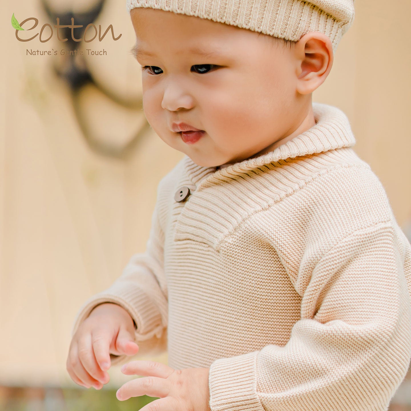 Heavyweight organic cotton knitted baby romper