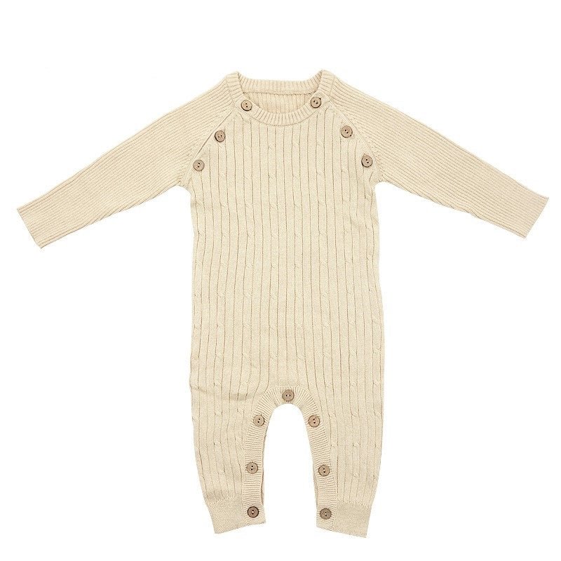 Organic baby summer jumpsuit with mini cable knit texture and coconut shell buttons