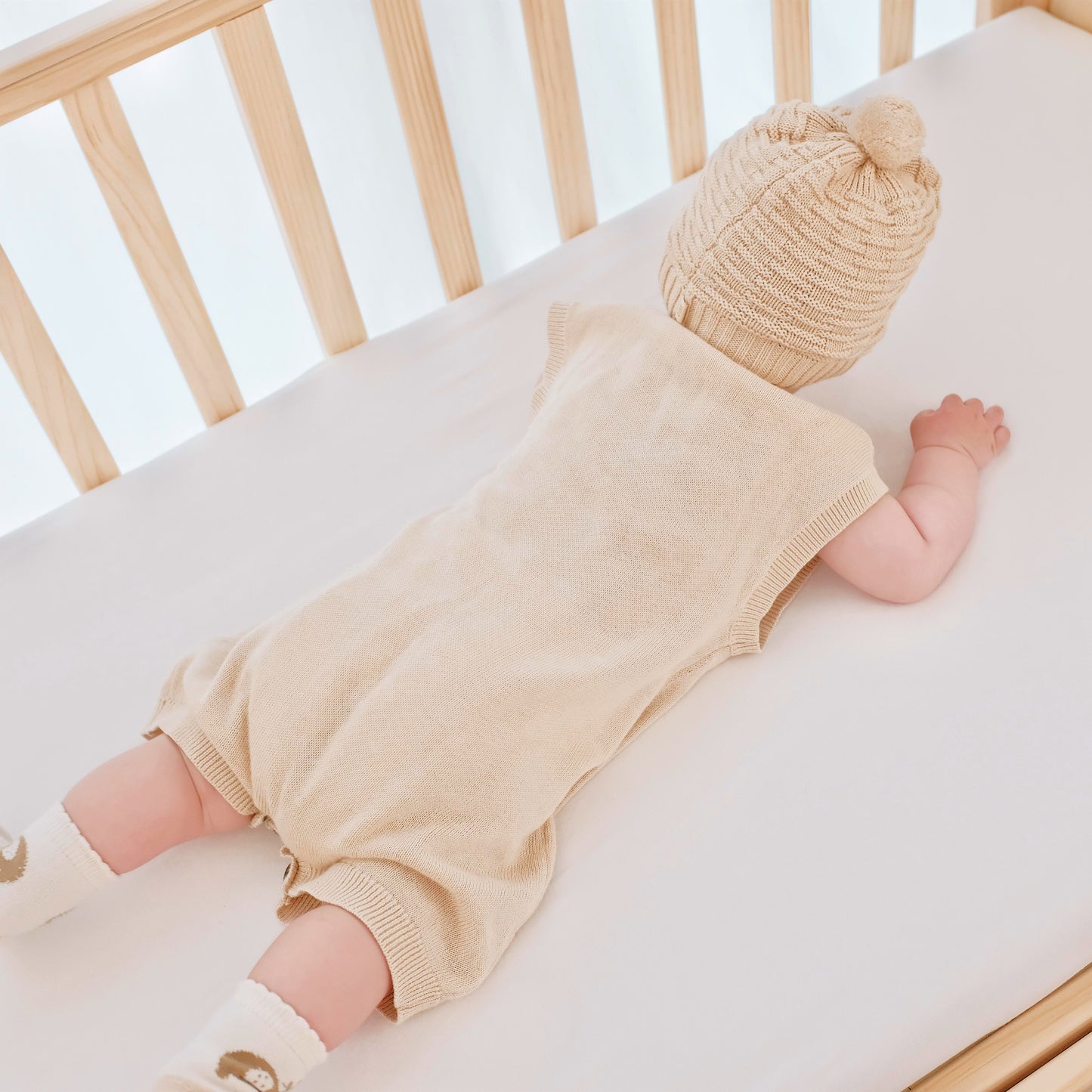 Soft organic baby sweater romper