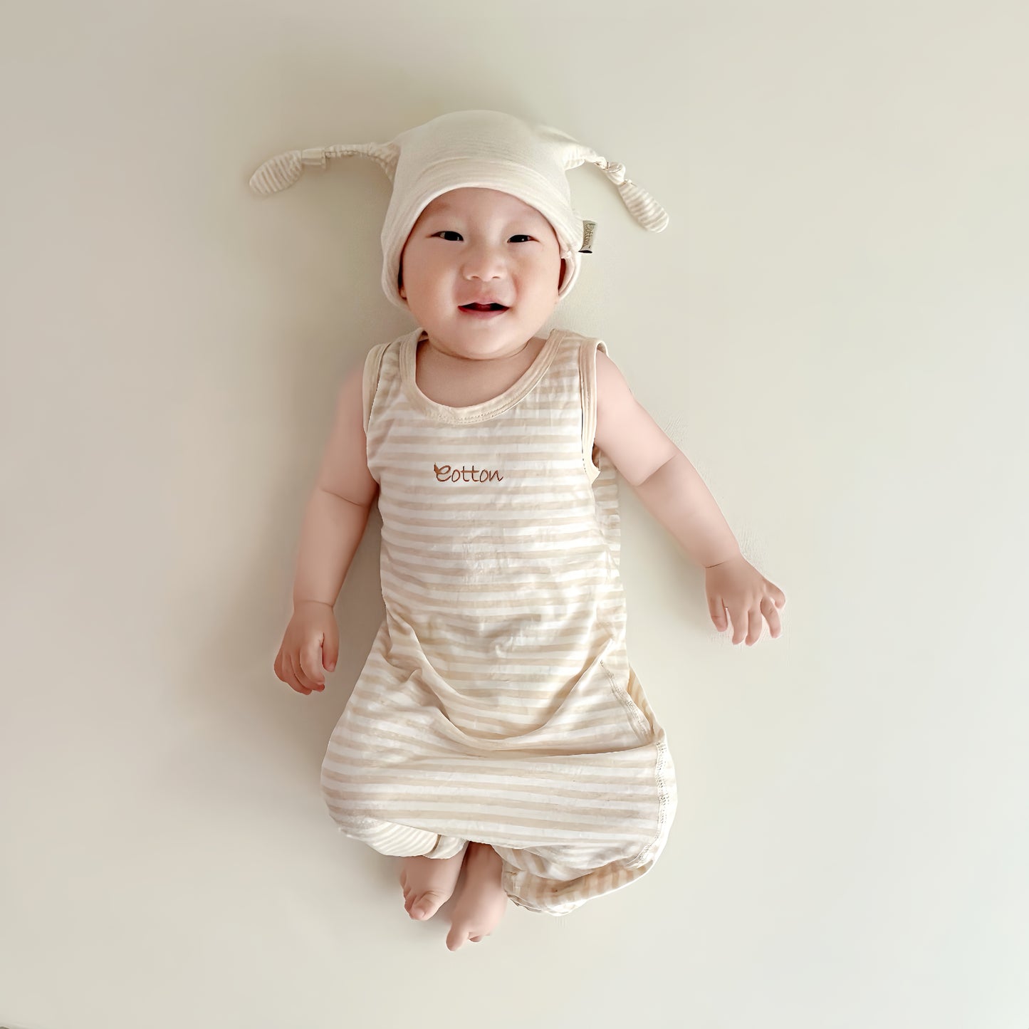 Sleeveless organic jersey cotton baby gown in soft white for summer | Eotton Canada