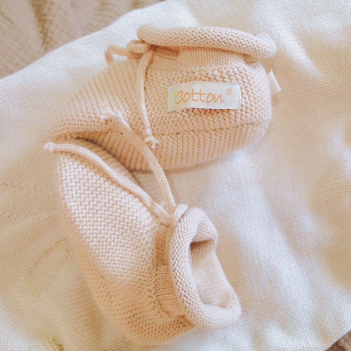 Eotton Canada organic knitted booties perfect for a luxury newborn gift set | Eotton Canada