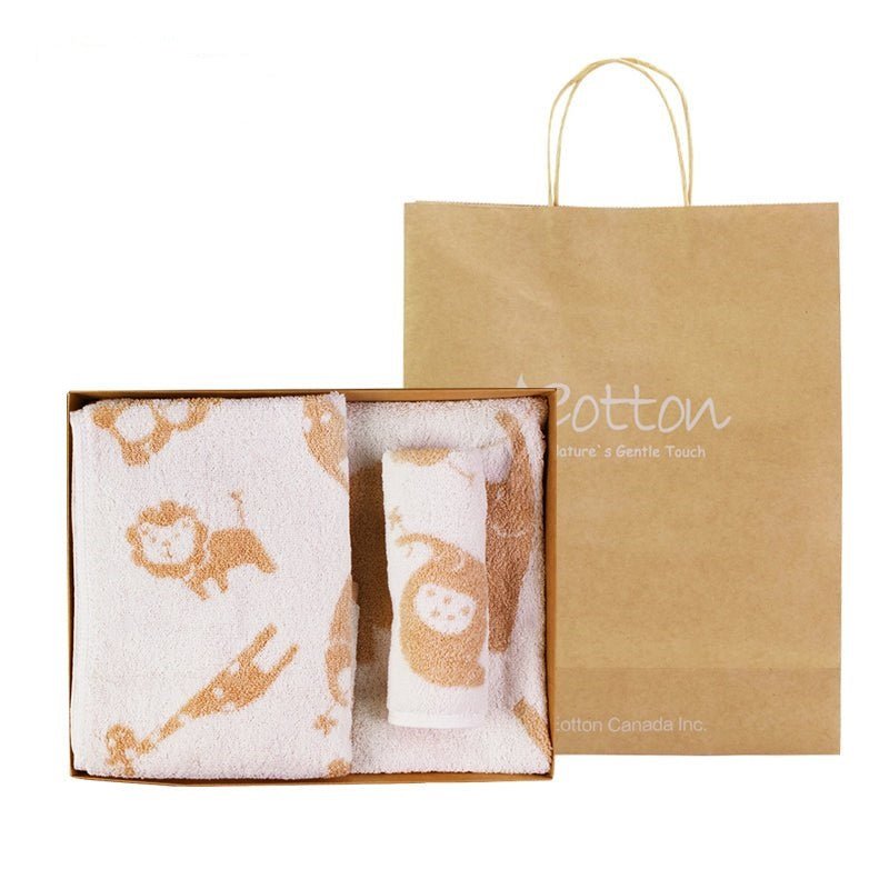 Close up view of the unbleached nature colored cotton baby bath towel woven with an organic jungle animals jacquard design.