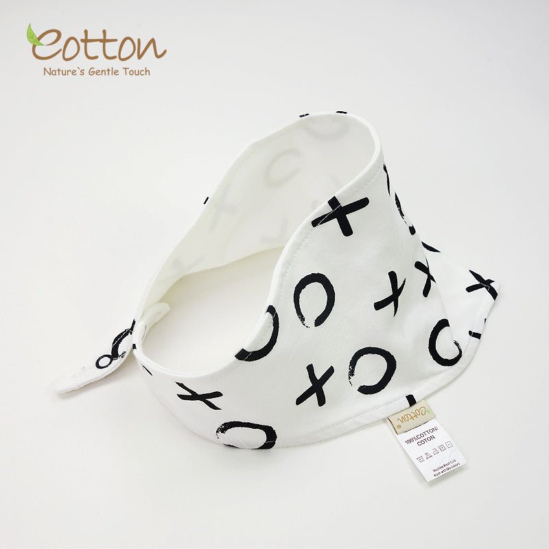 Detailed texture view of the soft double layer organic cotton stretch fabric on a monochrome infant accent scarf.