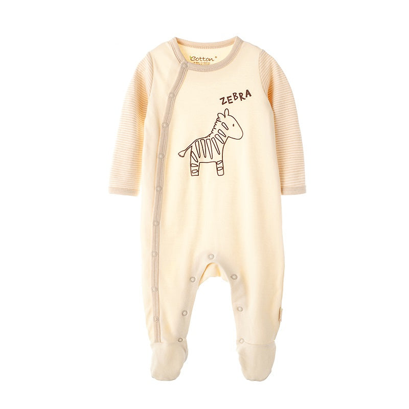 Close-up of curved side-snap closure on an organic zebra baby jumpsuit for easy dressing