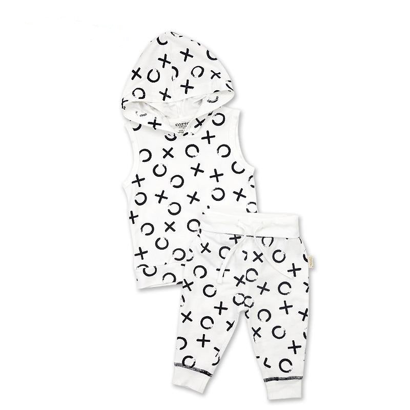 Unisex organic infant hooded vest and pants clothing set in white cotton with an abstract black X and O graphic layout.