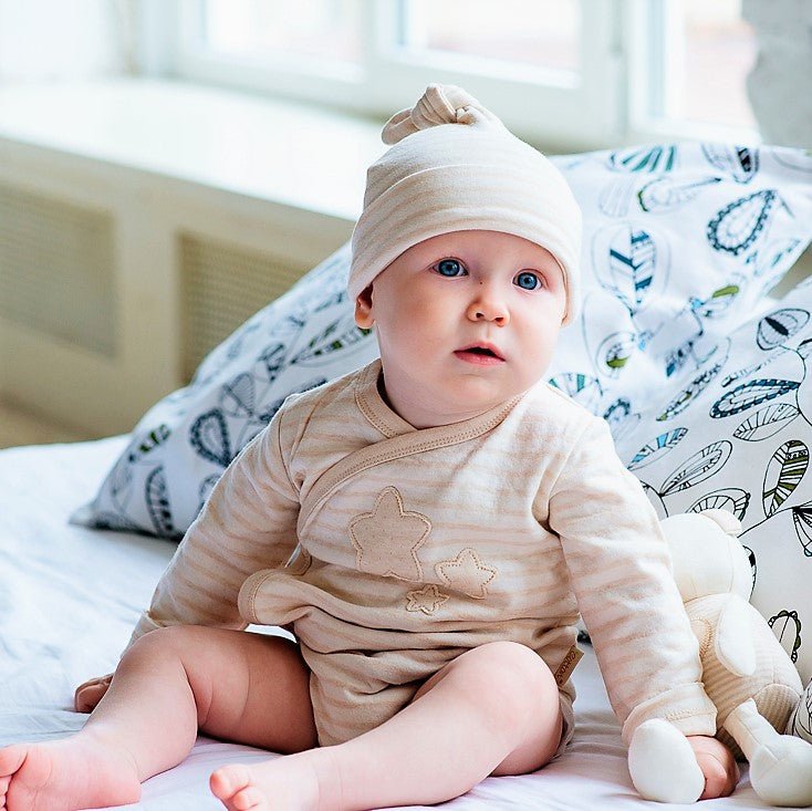 Soft organic baby kimono with side-snap wrap and designer raw-cut cuffs | Eotton Canada