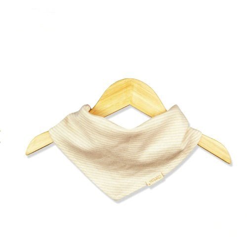 Close up of the teddy bear and moon pattern on a natural organic baby bib | Eotton Canada