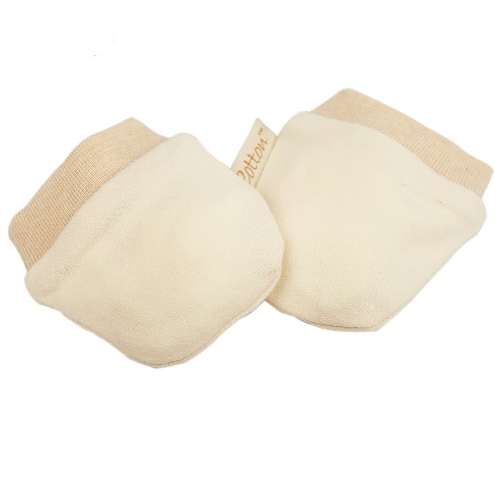 Detailed texture view of our stay on infant mittens eczema safe fabric that is chemical free for chewing babies.